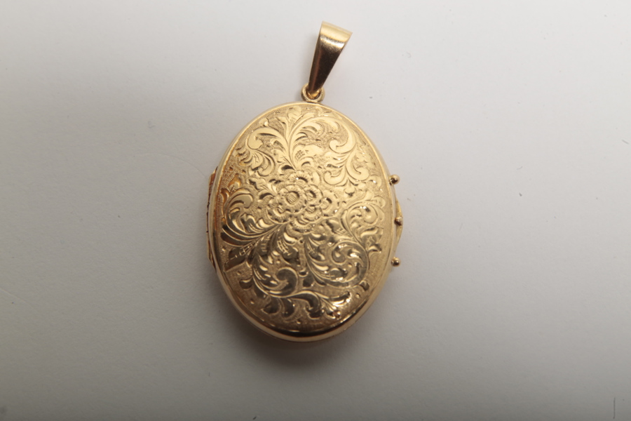 Hängsmycke/fotogömma 18k guld