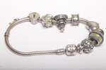 Pandora armband- Sterlingsilver, Med berlocker