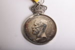Medalj i silver- "Gustaf.V"- K. Patriotiska Sällskapet